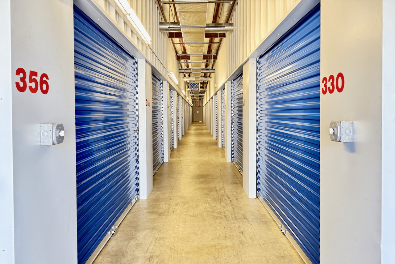 Climate-controlled storage hallway with bright lightin